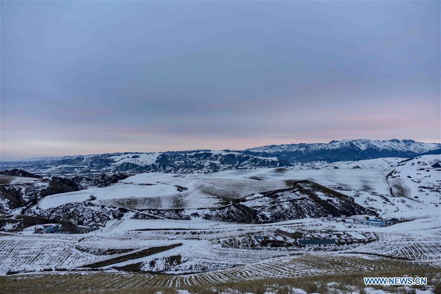 Photo taken on Nov. 23, 2018 shows snow-covered field in Qitai County, northwest China\'s Xinjiang Uygur Autonomous Region. (Xinhua/Zhao Ge)