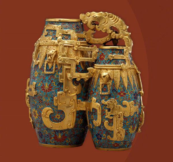 A cloisonne enamel paired jar with lotus design from the Qianlong Period of the Qing Dynasty.  (Photo/Official Weibo account of the Palace Museum)