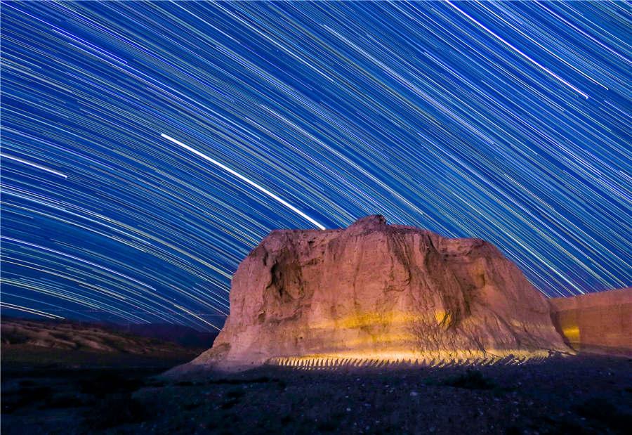 The Great Wall pier under the Milky Way in Gansu Province. (Photo provided to chinadaily.com.cn)

During the first phase of the program in October, different creation teams were sent to nine cities and prefectures in the province to survey local cultural and tourism elements including scenic spots, history, folk customs and food. So far, 502 articles have been created and published online, while more than 10,000 pictures and about 50 videos have been shot.

vGansu will launch the next phase by focusing on its winter and spring tourism resources later, as well as promoting the construction of content clouds in other regions, to comprehensively improve its competitiveness in tourism.