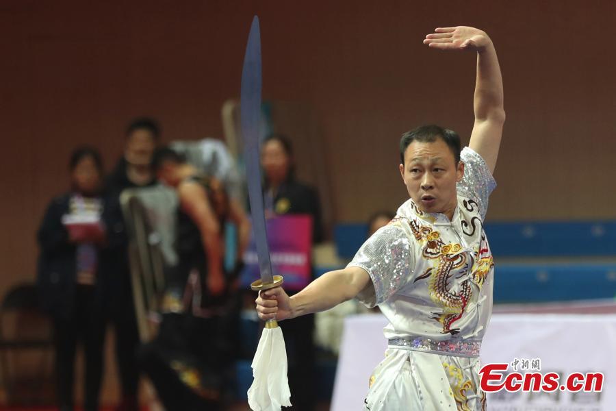 An athlete competes at the first Asian Traditional Wushu (Kungfu) Championship in Nanjing, East China’s Jiangsu province on November 29, 2018. The event attracts athletes from 12 countries and regions including China, Brunei, India, Japan, and Kazakhstan to take part in. (Photo: China News Service/ Yang Bo)