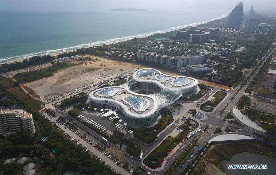 Photo taken on Dec. 1, 2018 by a drone shows an international duty free mall in Sanya, south China\'s Hainan Province. Effective on Saturday, China\'s Hainan Province raised its annual tax-free shopping quota to 30,000 yuan (about 4,300 U.S. dollars) per year from the current 16,000 yuan for travelers, without limit on the number of purchases, according to a joint statement from the Ministry of Finance (MOF) and China\'s customs and taxation authorities. (Xinhua/Yang Gaunyu)