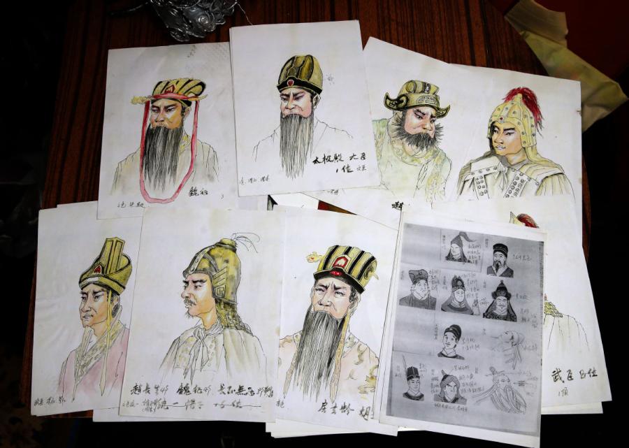 Han Xiaoli creates various headwear pieces for different stories and characters in qinqiang opera. (Photo by Huo Yan/chinadaily.com.cn)