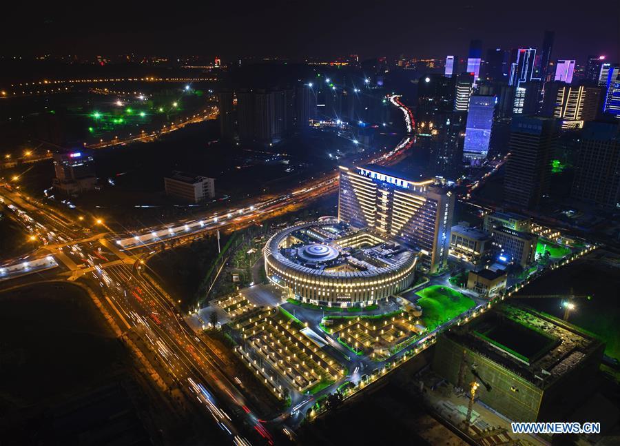 Aerial photo taken on Sept. 11, 2018 shows the night scenery of Guangxi International Zhuang Medicine Hospital in Nanning, capital city of south China\'s Guangxi Zhuang Autonomous Region. This year marks the 60th anniversary of the establishment of the Guangxi Zhuang Autonomous Region. (Xinhua/Zhou Hua)