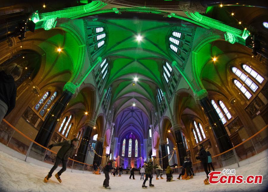 People skate on a temporary ice rink in the Gouwe Kerk church, a Gothic Revival church built between 1902 and 1904, in the center of Gouda, central Netherlands, Wednesday, Dec. 5, 2018. The ice rink will remain in the church till Dec. 16, and from Dec. 19, people can enjoy skating on the rink in front of the historic town hall of Gouda. (Photo/Agencies)