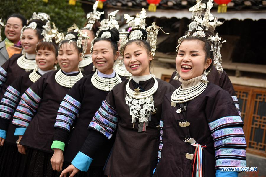 Women dressed in festive costumes attend an activity to celebrate the new year of Dong ethnic group at Jiasuo Dong Village of Zhongchao Township in Liping County, southwest China\'s Guizhou Province, Dec. 9, 2018. Dong people celebrated the new year through various activities on Dec. 7-9. (Xinhua/Yang Wenbin)