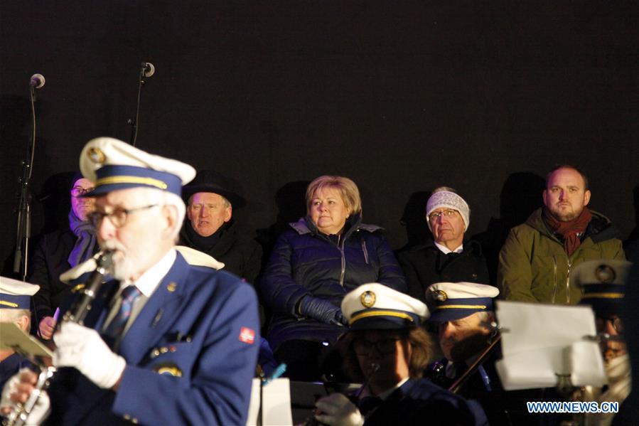 Norwegian Prime Minister Erna Solberg (back 3rd R) attends the inauguration ceremony on the Halogaland Bridge near Norway\'s northern port city of Narvik, Dec. 9, 2018. A ceremony was held Sunday to officially open Norway\'s second largest bridge that has been built by a Chinese company and its partners some 220 km inside the Arctic Circle. With a total length of 1,533 meters and a free span of 1,145 meters, the Halogaland Bridge near Norway\'s northern port city of Narvik is the longest suspension bridge within the Arctic Circle. (Xinhua/Liang Youchang)