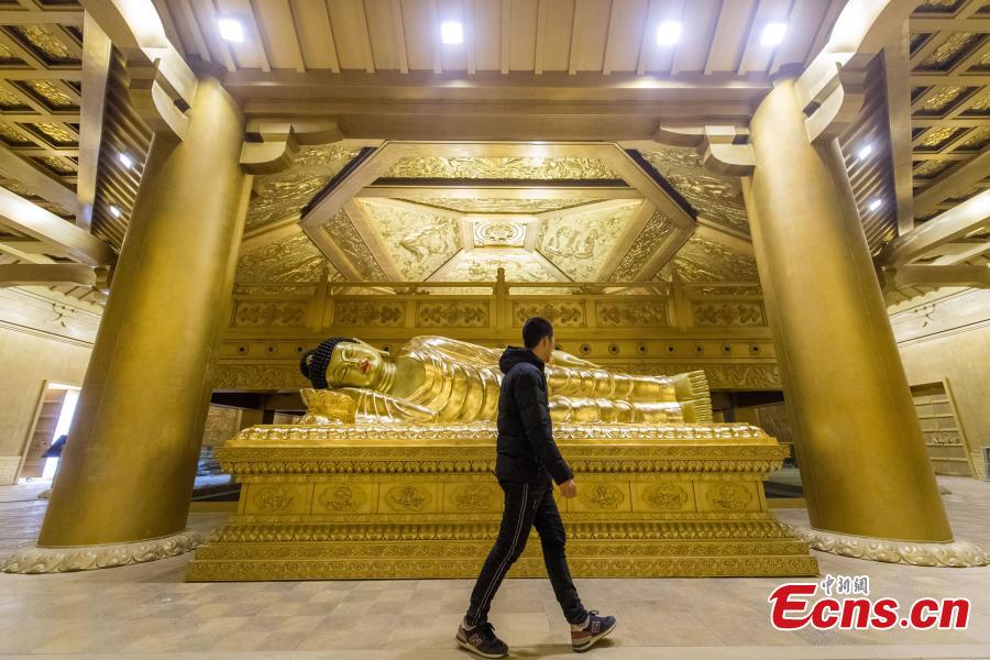 This photo shows the Buddha lying at the palace in Taiyuan Longquan Temple, Shanxi Province, on December 7, 2018. The project of restoring several historic buildings at Taiyuan Longquan Temple to preserve original Tang Dynasy (AD 618-907) architecture is ongoing. (Photo: China News Service/ Wei Liang)