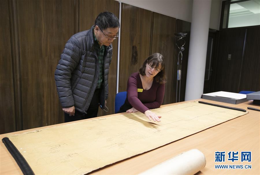 Archivist Rachel Gill shows the original designs for Chinese cruiser Zhiyuan at Tyne & Wear Archives in the city of Newcastle upon Tyne, England, Nov. 2, 2018. Zhiyuan, built and completed in England in 1887, was one of the most advanced warships in the Beiyang Fleet. It sank after the imperial Chinese navy was defeated in 1894 by the Japanese navy in the Battle of the Yellow Sea. The museum has a set of seven design drawings related to the Chinese cruiser. (Photo/Xinhua)