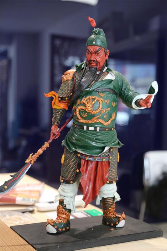 A dough figurine of Guan Yu, a character from Romance of the Three Kingdoms.  (Photo by Li Hao/for chinadaily.com.cn)