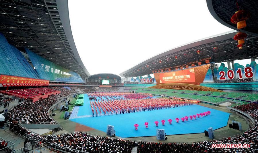 A grand gathering is held to celebrate the 60th anniversary of the founding of south China\'s Guangxi Zhuang Autonomous Region in Nanning, capital of Guangxi, Dec. 10, 2018. (Xinhua/Chen Jianli)