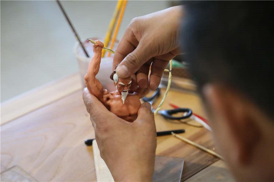A vivid character from a Chinese legend, made in minutes. (Photo by Li Hao/for chinadaily.com.cn)