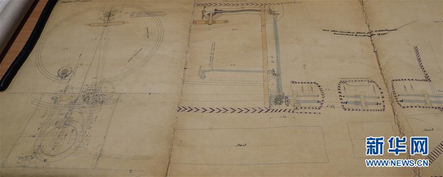 Archivist Rachel Gill shows the original designs for Chinese cruiser Zhiyuan at Tyne & Wear Archives in the city of Newcastle upon Tyne, England, Nov. 2, 2018. Zhiyuan, built and completed in England in 1887, was one of the most advanced warships in the Beiyang Fleet. It sank after the imperial Chinese navy was defeated in 1894 by the Japanese navy in the Battle of the Yellow Sea. The museum has a set of seven design drawings related to the Chinese cruiser. (Photo/Xinhua)