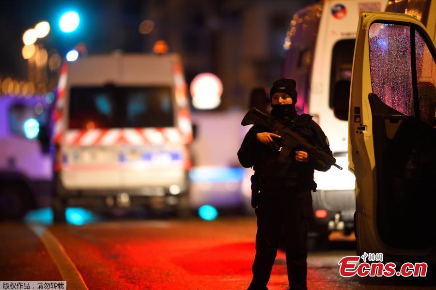 A policeman stands in the Neudorf area of Strasbourg, eastern France, after a shooting breakout, on December 11, 2018. (Photo/Agencies)
