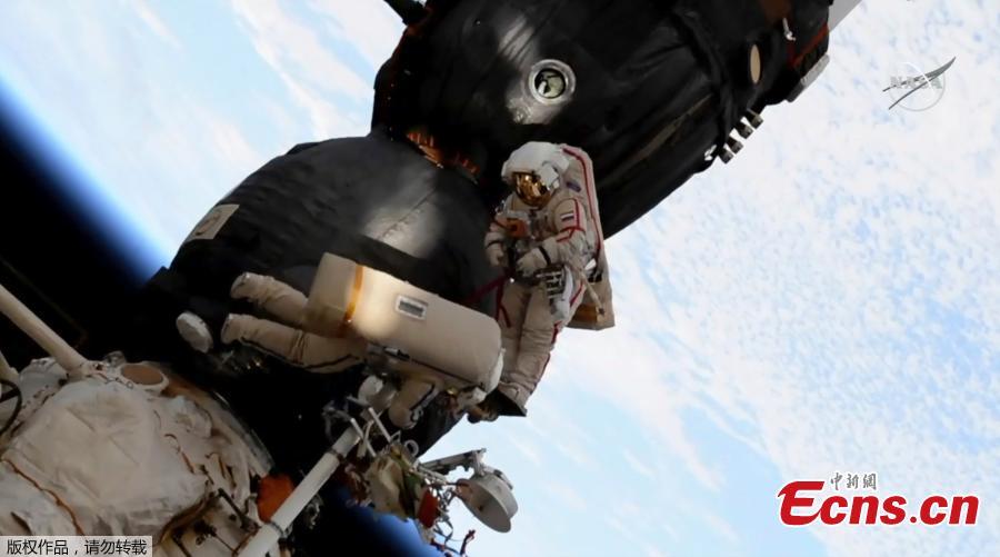 Two Russian cosmonauts have ventured outside the International Space Station today to inspect a section of a Russian spacecraft where a small hole was spotted. The mysterious leak was discovered on  August 30 in the Russian Soyuz craft which is attached to the ISS. It was initially believed to have been caused by a small meteorite and astronauts used tape to seal the leak after it caused a minor loss of pressure. Now, the two astronauts have confirmed the hole is safe - and the craft will be used again. (Photo/Agencies)