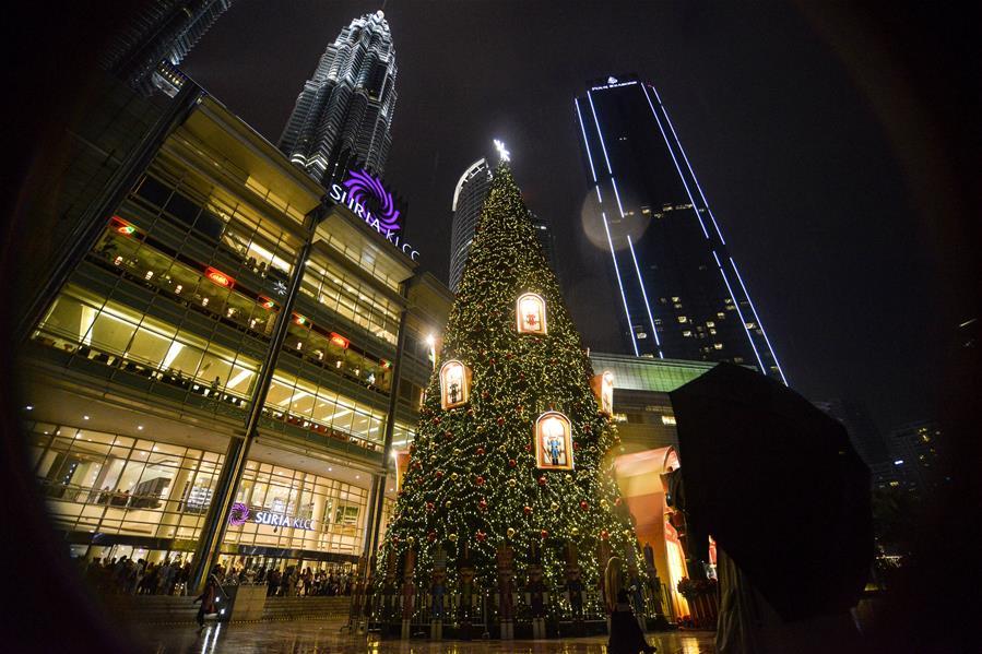 An illuminated Christmas tree is pictured outside a shopping mall in Kuala Lumpur, Malaysia, on Dec. 16, 2018. (Xinhua/Chong Voon Chung)