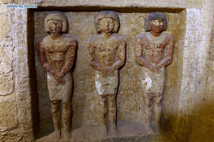 Photo taken on Dec. 15, 2018 shows the sculptures in a tomb in Saqqara Necropolis in Giza, Egypt. Egyptian Antiquities Minister Khaled al-Anany announced Saturday the discovery of an \