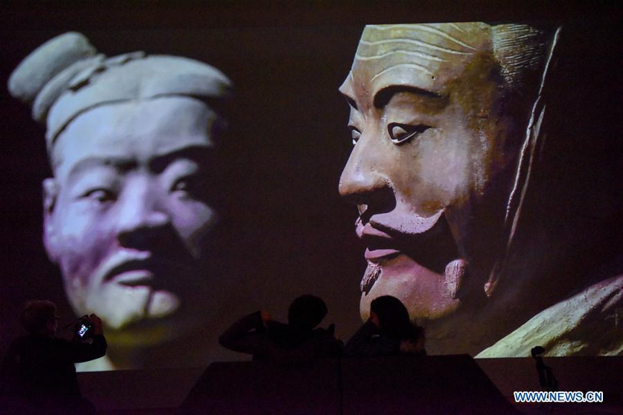 Visitors wait for entering the exhibition Terracotta Warriors: Guardians of Immortality at the National Museum of New Zealand in Wellington, New Zealand, on Dec. 15, 2018. The landmark exhibition of Terracotta Warriors: Guardians of Immortality opened to public on Saturday at the National Museum of New Zealand. The exhibition features eight warriors standing 180 cm tall, and two full-size horses from the famous terracotta army, as well as two half-size replica bronze horse-drawn chariots. Also on display are more than 160 exquisite works of ancient Chinese art made from gold, jade and bronze. \