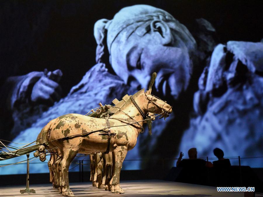 The exhibition Terracotta Warriors: Guardians of Immortality is held at the National Museum of New Zealand in Wellington, New Zealand, on Dec. 15, 2018. The landmark exhibition of Terracotta Warriors: Guardians of Immortality opened to public on Saturday at the National Museum of New Zealand. The exhibition features eight warriors standing 180 cm tall, and two full-size horses from the famous terracotta army, as well as two half-size replica bronze horse-drawn chariots. Also on display are more than 160 exquisite works of ancient Chinese art made from gold, jade and bronze. \