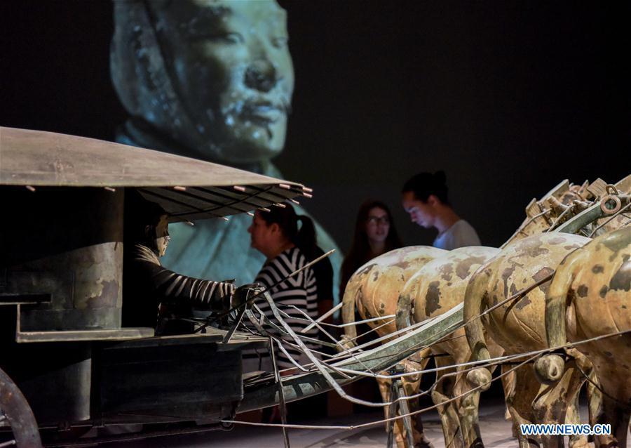 Visitors wait for entering the exhibition Terracotta Warriors: Guardians of Immortality at the National Museum of New Zealand in Wellington, New Zealand, on Dec. 15, 2018. The landmark exhibition of Terracotta Warriors: Guardians of Immortality opened to public on Saturday at the National Museum of New Zealand. The exhibition features eight warriors standing 180 cm tall, and two full-size horses from the famous terracotta army, as well as two half-size replica bronze horse-drawn chariots. Also on display are more than 160 exquisite works of ancient Chinese art made from gold, jade and bronze. \