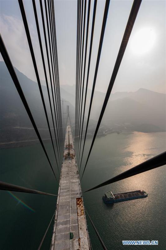 Photo taken on Dec. 16, 2018 shows the Xiangxi River Bridge in Zigui County of Yichang City, central China\'s Hubei Province. The closure of the bridge with a 470-meter main span was finished on Sunday. (Xinhua/Zheng Jiayu)