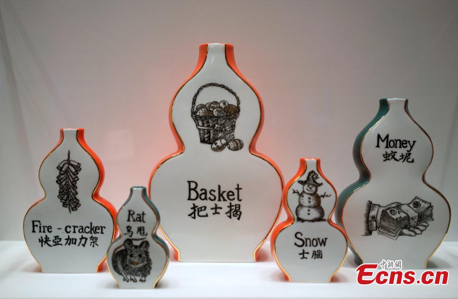 The Golden Splendors: 20th-Century Painted Porcelains of Hong Kong is underway at Hong Kong Heritage Museum, Dec. 18, 2018. As a world trading port in the 20th century, Hong Kong developed unique painted porcelain with diverse shapes and rich decorations using continually innovative techniques. The exhibition showcases painted porcelain made by local painters and factories, including vintage porcelain and armorial porcelain, produced mainly for export, as well as ceramic items for decoration and household use commonly found in Hong Kong. (Photo: China News Service/Zhang Wei)