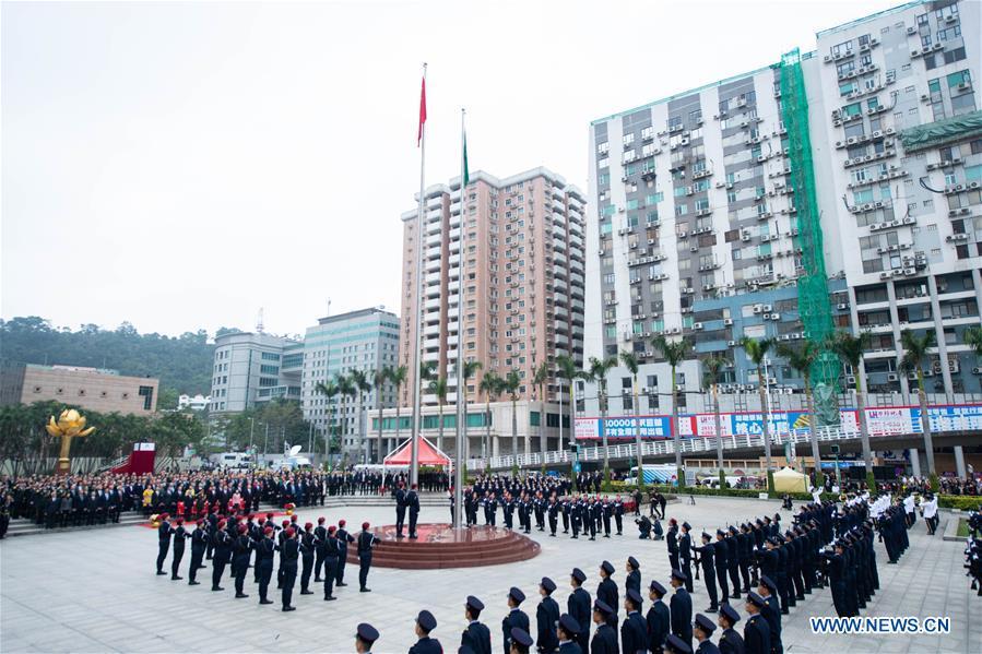 A flag-raising ceremony is held to celebrate the 19th anniversary of Macao\'s return to the motherland in Macao, south China, Dec. 20, 2018. (Xinhua/Cheong Kam Ka)
