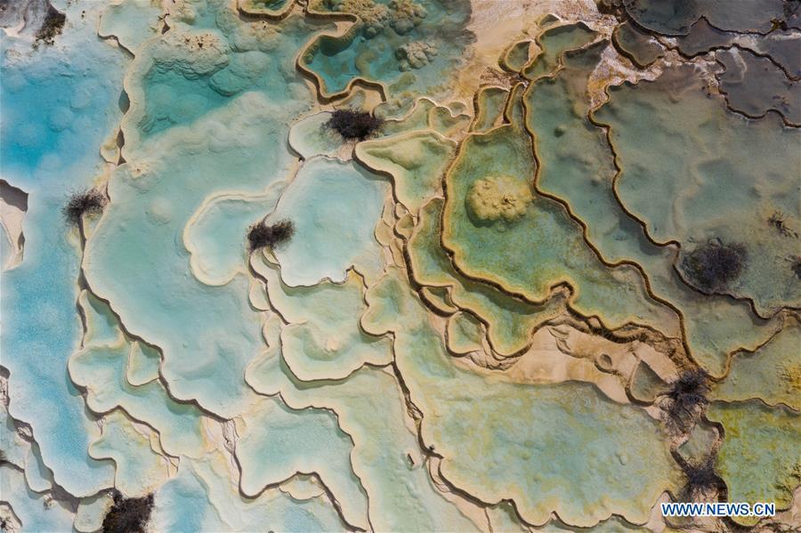 Aerail photo taken on Oct. 19, 2018 shows the beautiful scenery of Huanglong Scenic and Historic Interest Area in Songpan County, southwest China\'s Sichuan Province. Colors make our world bright and beautiful. In 2018, Xinhua photographers across China explored views from the sky with drones. Here are these drone photos with amazing colors. (Xinhua/Jiang Hongjing)