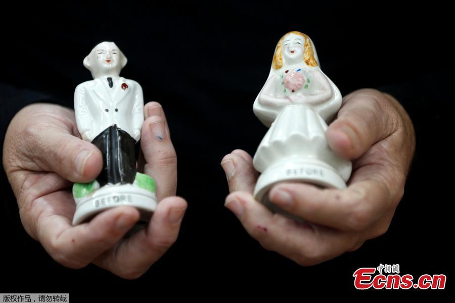 Eitan Bar-on holds a pair of salt and pepper shakers, part of his collection of 37,000 pairs of shakers, at a shack in the backyard of his home in Hadera, Israel Dec. 12, 2018.  Bar-on’s exhibit includes shaker Santas, Christmas trees, toilet seats, animals, figures in traditional dress and even a ceramic Queen Elizabeth and her dog. (Photo/Agencies)
