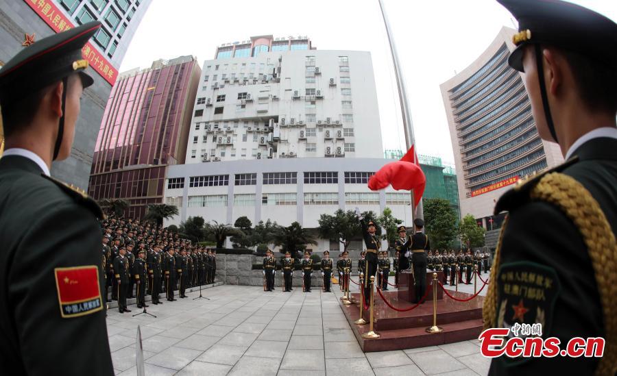 The Macao garrison of the Chinese People\'s Liberation Army (PLA) holds a flag-raising ceremony to celebrate the 19th anniversary of Macao\'s return to the motherland in Macao, south China, Dec. 20, 2018.