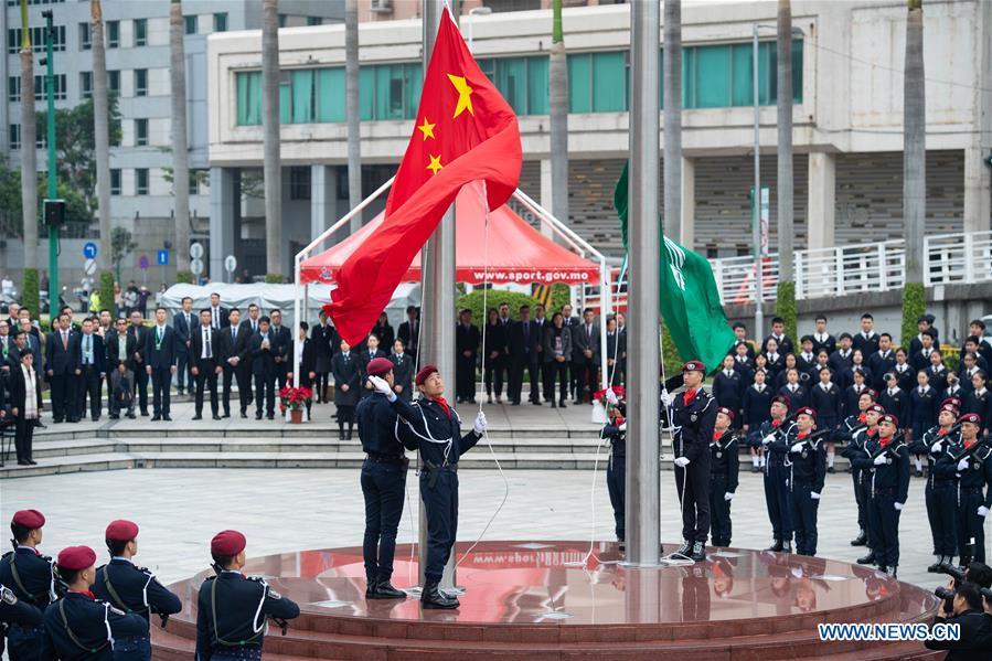 A flag-raising ceremony is held to celebrate the 19th anniversary of Macao\'s return to the motherland in Macao, south China, Dec. 20, 2018. (Xinhua/Cheong Kam Ka)