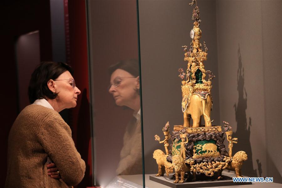A visitor looks at an exhibit at the exhibition \