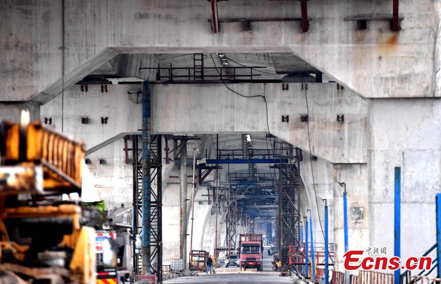 Photo taken on Dec. 20, 2018 shows the cross-Straits highway-rail bridge under construction in Pingtan, East China\'s Fujian Province. The first of its kind in China, the combined cross-sea rail and highway bridge across the Pingtan Straits has two layers, one for railways from Fuzhou to Pingtan, the other for a highway from Changle to Pingtan. The bridge spanning 16.45 km will open to traffic in 2019. (Photo: China News Service/Zhang Bin)