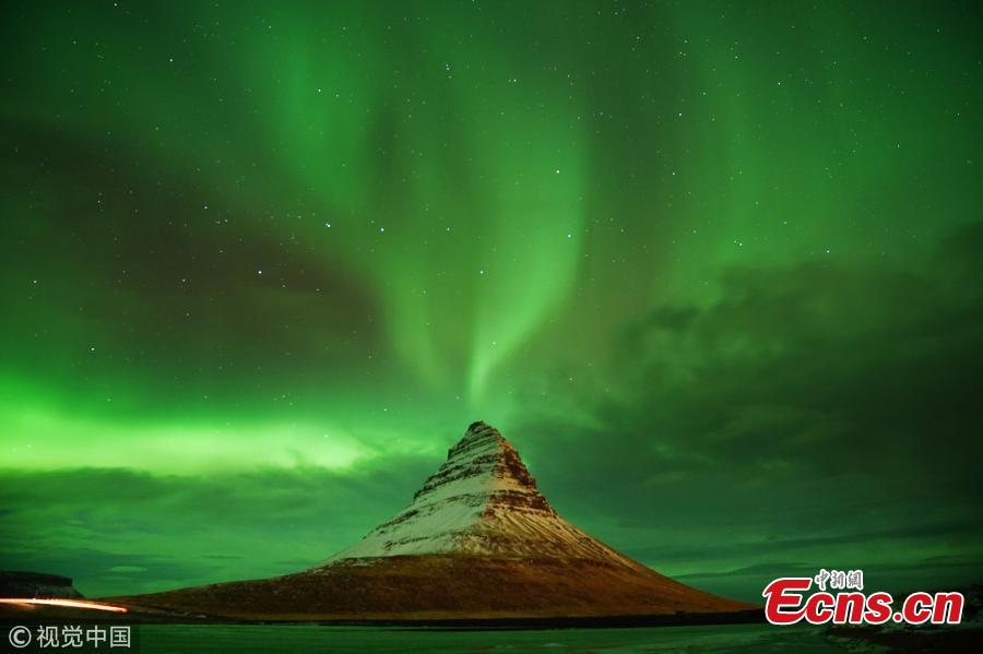 Aurora Borealis, the Northern Lights, over Kirkjufell, a 463 meter mountain on the west coast of Iceland. (Photo by Owen Humphreys/PA Images via Getty Images)