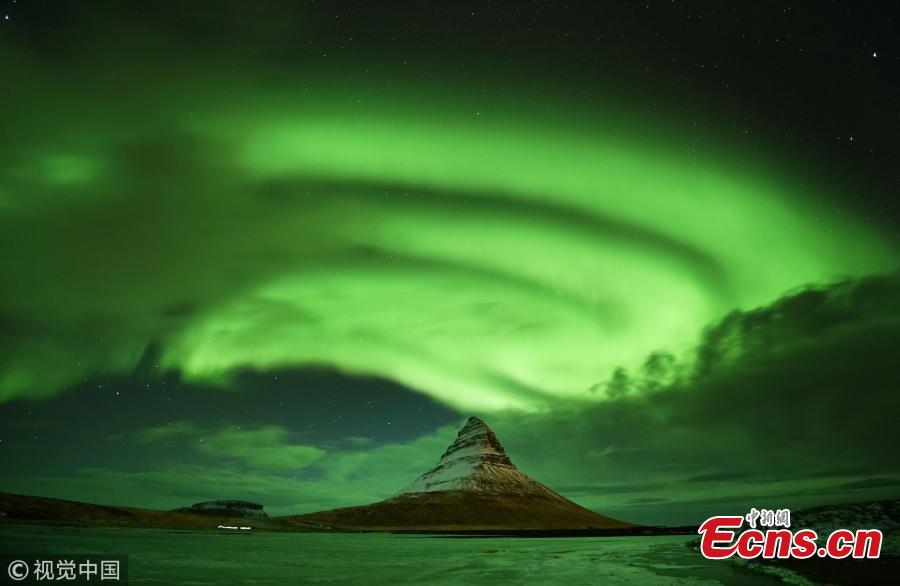 Aurora Borealis, the Northern Lights, over Kirkjufell, a 463 meter mountain on the west coast of Iceland. (Photo by Owen Humphreys/PA Images via Getty Images)
