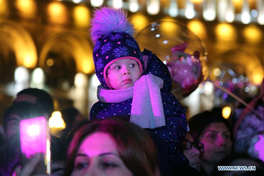 People take part in the Christmas tree lighting ceremony at the downtown Republic Square, in Yerevan, Armenia, Dec. 21, 2018. (Xinhua/Gevorg Ghazaryan)