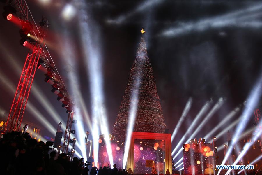 Photo taken on Dec. 21, 2018 shows the lit-up Christmas tree at the downtown Republic Square, heralding the start of New Year celebrations, in Yerevan, Armenia. (Xinhua/Gevorg Ghazaryan)