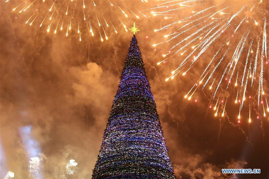 Photo taken on Dec. 21, 2018 shows the lit-up Christmas tree at the downtown Republic Square, heralding the start of New Year celebrations, in Yerevan, Armenia. (Xinhua/Gevorg Ghazaryan)