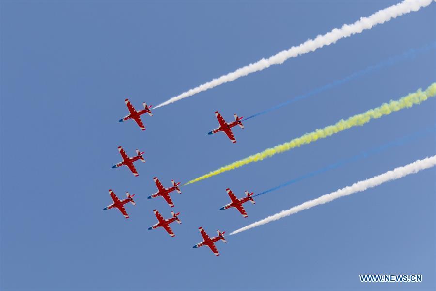 China\'s Hongying (Red Eagle) Aerobatic Team perform at the 12th China International Aviation and Aerospace Exhibition (Airshow China) in Zhuhai, south China\'s Guangdong Province, on Nov. 7, 2018. The living and working scenes of Chinese people in the past year have created a series of amazing views, some of which formed geometric figures. Those photos tell the development and progress of the country in 2018. (Xinhua/Liu Fang)