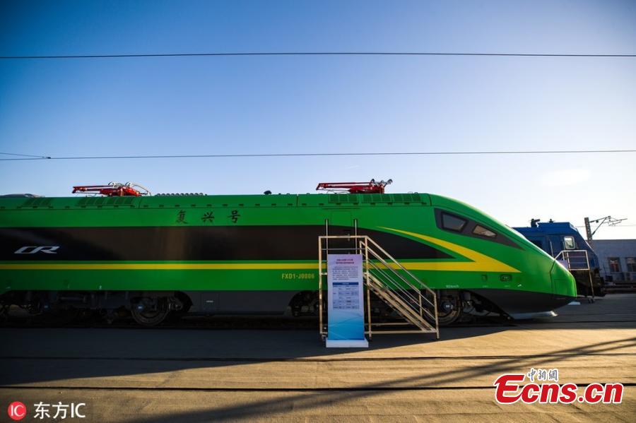 The China Railway S&T Innovation Achievement Exhibition opens at China National Railway Test Centre in Beijing, Dec. 24, 2018. The exhibition showcases China\'s homegrown railway technology and equipment, displaying the Fuxing, or Rejuvenation, bullet trains in various configurations. Entirely designed and manufactured in China, today\'s Fuxing trains are more spacious and energy efficient, with a longer service life and better reliability than previous models. The exhibition includes the 17-car version that runs up to 350 kilometers an hour, an eight-car version that runs at 250 kilometers per hour and trains with a designed speed of 160 kilometers an hour. (Photo/IC)