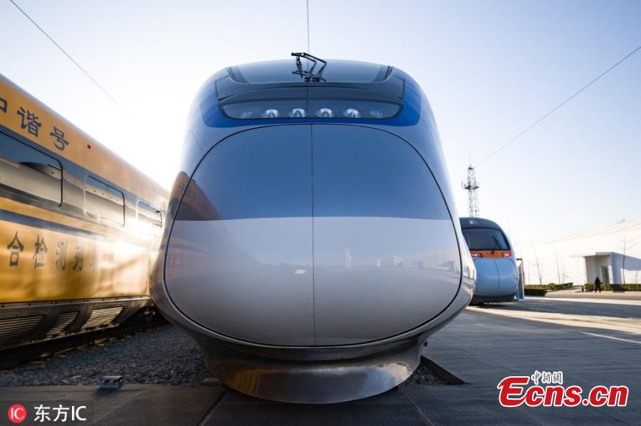 The China Railway S&T Innovation Achievement Exhibition opens at China National Railway Test Centre in Beijing, Dec. 24, 2018. The exhibition showcases China\'s homegrown railway technology and equipment, displaying the Fuxing, or Rejuvenation, bullet trains in various configurations. Entirely designed and manufactured in China, today\'s Fuxing trains are more spacious and energy efficient, with a longer service life and better reliability than previous models. The exhibition includes the 17-car version that runs up to 350 kilometers an hour, an eight-car version that runs at 250 kilometers per hour and trains with a designed speed of 160 kilometers an hour. (Photo/IC)