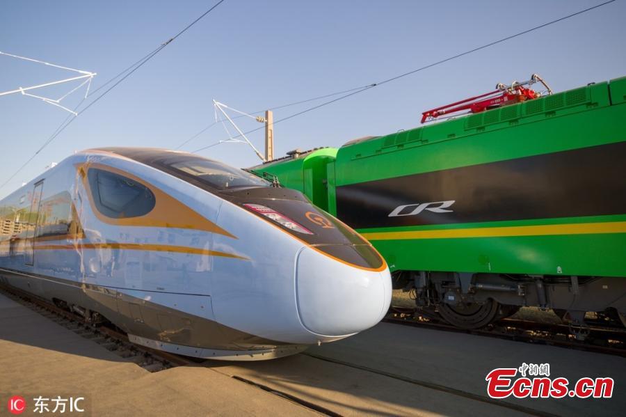 The China Railway S&T Innovation Achievement Exhibition opens at China National Railway Test Centre in Beijing, Dec. 24, 2018. The exhibition showcases China\'s homegrown railway technology and equipment, displaying the Fuxing, or Rejuvenation, bullet trains in various configurations. Entirely designed and manufactured in China, today\'s Fuxing trains are more spacious and energy efficient, with a longer service life and better reliability than previous models. The exhibition includes the 17-car version that runs up to 350 kilometers an hour, an eight-car version that runs at 250 kilometers per hour and trains with a designed speed of 160 kilometers an hour. (Photo/IC)