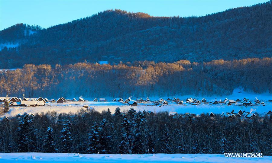 Photo taken on Dec. 22, 2018 shows the herdsmen\'s settlements at the Hom scenic area of Kanas, northwest China\'s Xinjiang Uygur Autonomous Region. (Xinhua/Sadat)