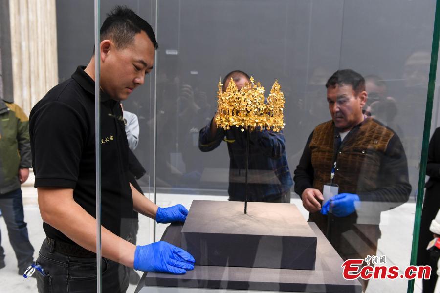 A gold crown discovered in Afghanistan is on display ahead of the \