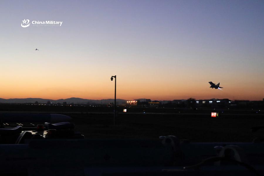 A J-10 fighter jet attached to an aviation brigade of the air force under the PLA Northern Theater Command takes off from a military airfield during a recent night flight training exercise.  (Photo/eng.chinamil.com.cn)