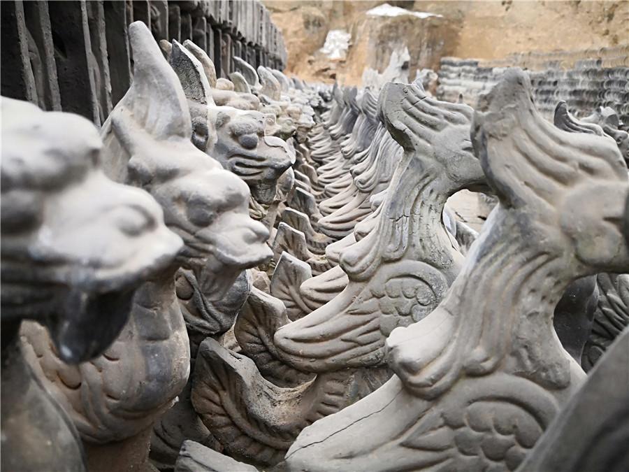 Sculptures of traditional mythical beasts.  (Photo by Wei Jianjun for chinadaily.com.cn)