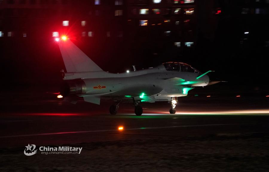 A J-10 fighter jet attached to an aviation brigade of the air force under the PLA Northern Theater Command taxis on the runway before takeoff during a recent night flight training exercise. (Photo/eng.chinamil.com.cn)