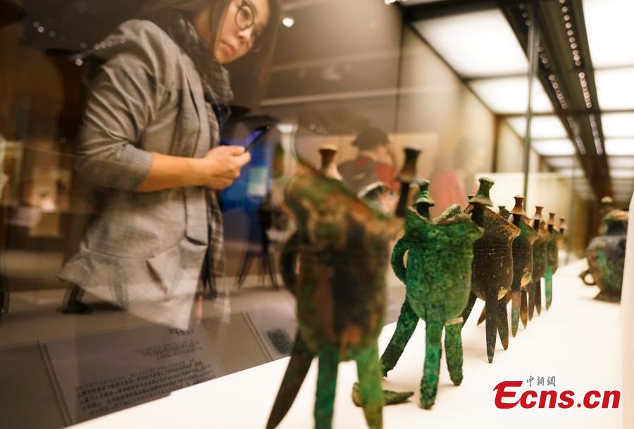 Cultural relics, including bronze wares and silver ingots, retrieved by police are on display at an exhibition at the National Museum of China in Beijing, Dec. 26, 2018. The exhibition displays 750 precious artifacts retrieved during police efforts in recent years fighting crime involving stolen cultural treasures, which hail from Neolithic times through to the Qing Dynasty. (Photo: China News Service/Du Yang)