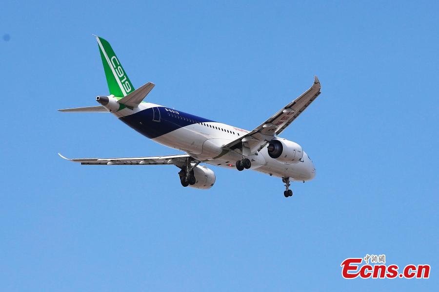 China\'s domestically developed C919 passenger jet is seen during a test flight at Pudong International Airport in Shanghai, Dec. 28, 2018. The third C919 plane, developed by the state-owned Commercial Aircraft Corp. of China (COMAC), took a test flight at the busy airport\'s 4th runway. (Photo: China News Service/Yin Liqin)