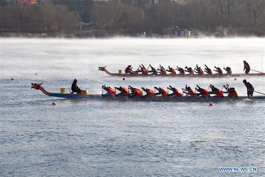 Teams of participants compete during a winter dragon boat race in Jilin City, northeast China\'s Jilin Province, Dec. 28, 2018. A total of 15 teams from home and abroad participated in the race on Friday. (Xinhua/Zhu Wanchang)