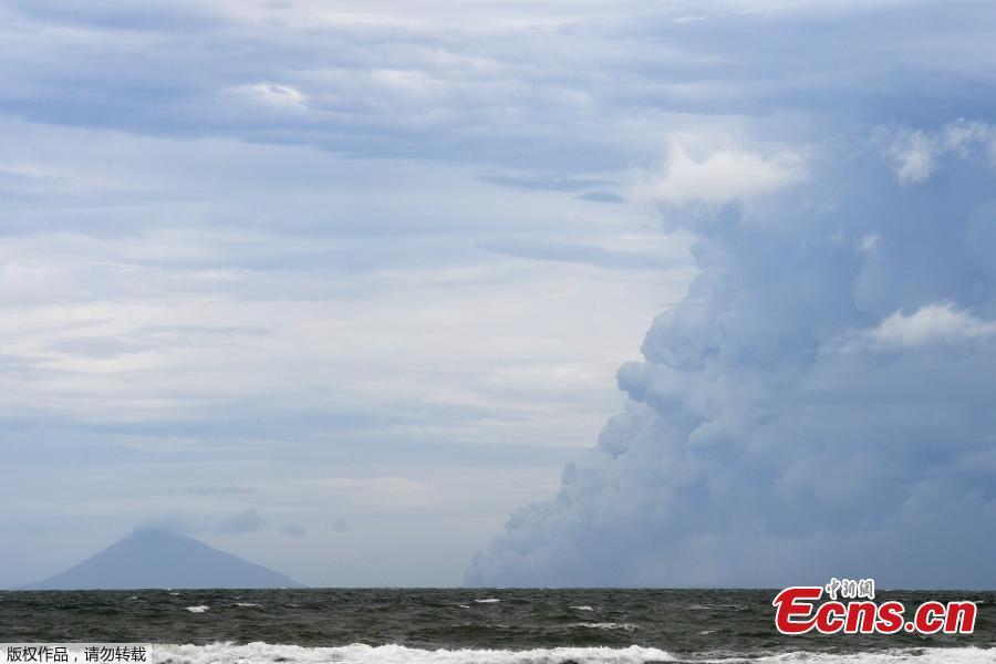Mount Anak Krakatau volcano spews hot ash as seen from Sunda Strait, Lampung Province, Indonesia, Dec. 28, 2018. Indonesia on Thursday raised the alert level for the erupting Anak Krakatau volcano to the second-highest, and ordered all flights to steer clear, days after it triggered a tsunami that killed at least 430 people. (Photo/Agencies)